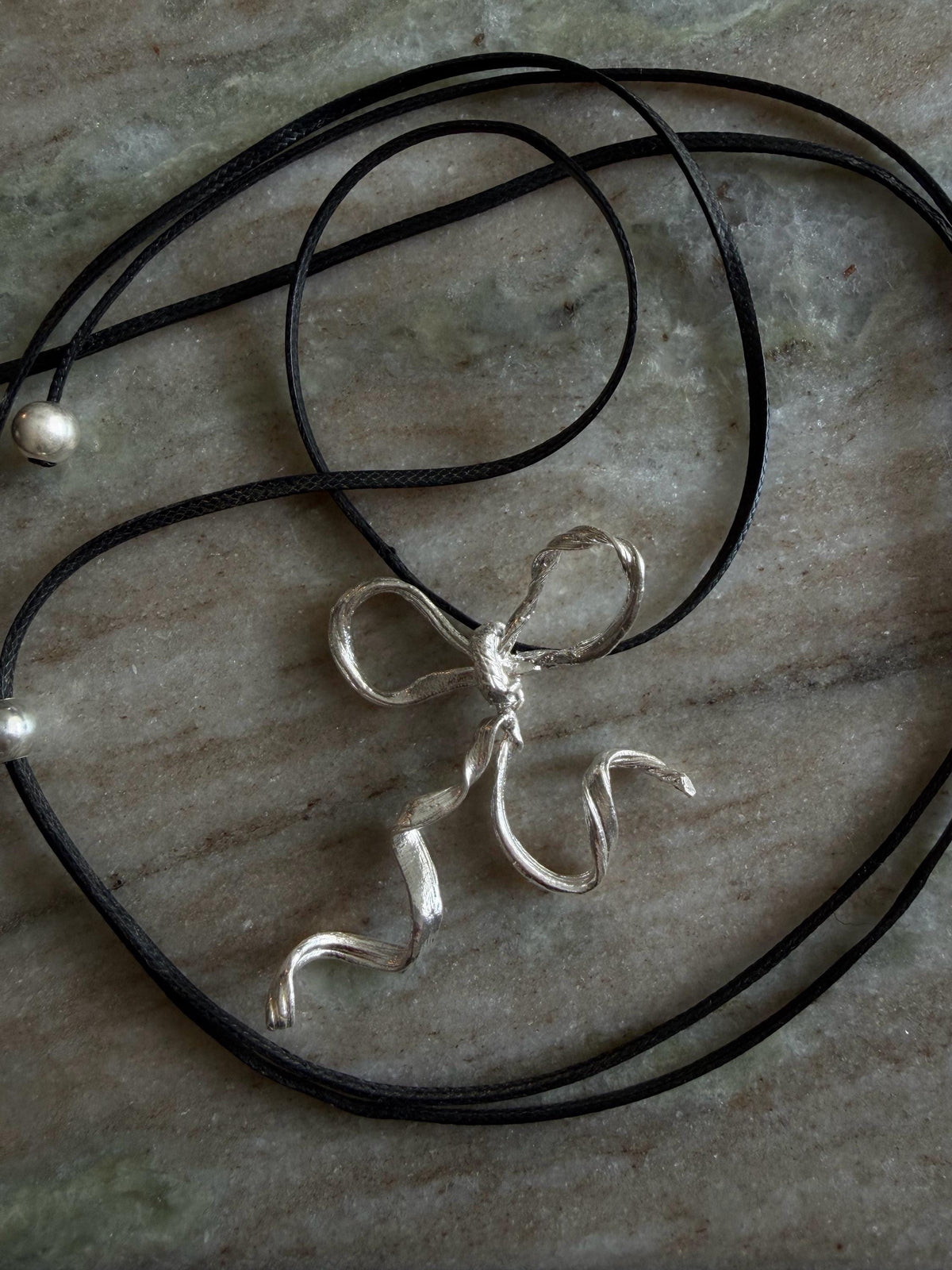 Sterling Silver 925 bow necklace on black cord - KathyRossJewelry