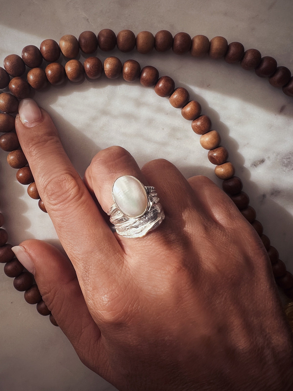 Silver band ring with oval white Mabe Pearl Ring - KathyRossJewelry
