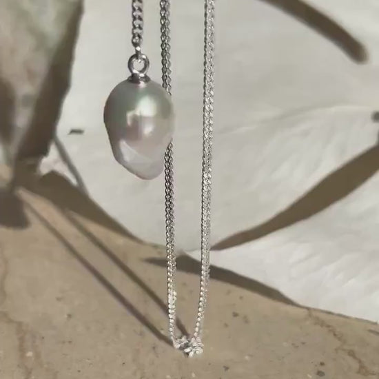 Long silver lariat necklace with baroque pearls